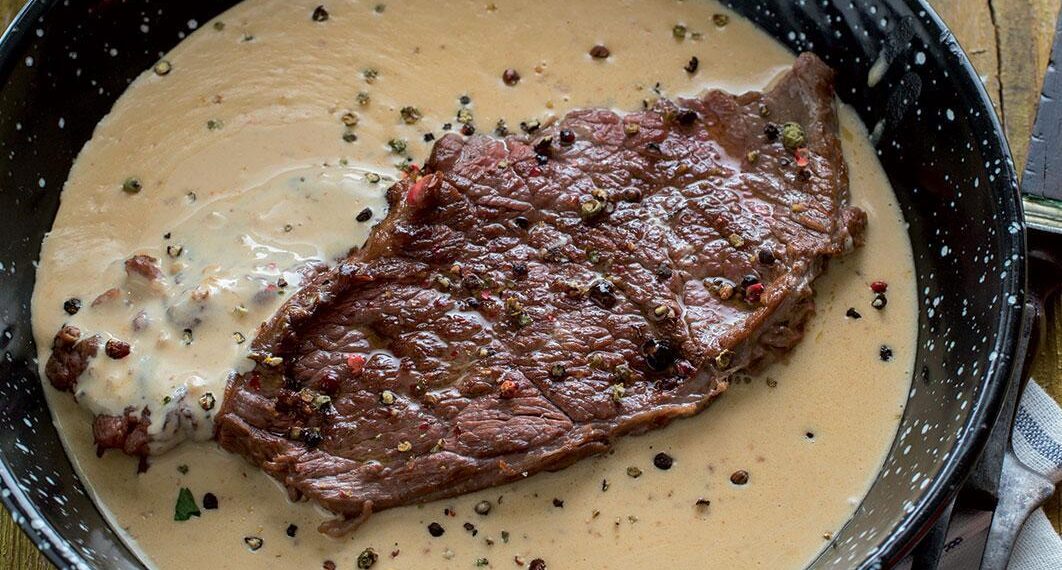 Bife com molho de alho