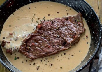 Bife com molho de alho