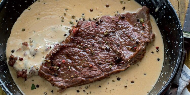 Bife com molho de alho
