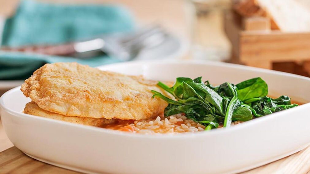Filetes de pescada com arroz de tomate