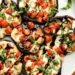 Cogumelos recheados com queijo e tomate