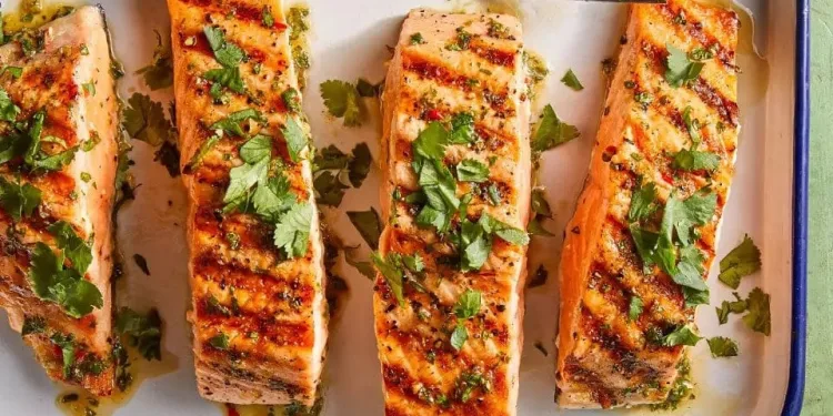 Salmão com laranja e coentros