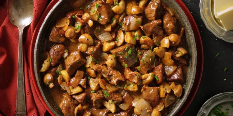 Vitela estufada com cogumelos