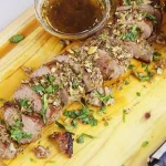 Lombinhos de porco com alho e coentros