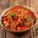 Carne guisada com tomate