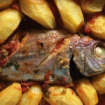Imperador no forno com batatas