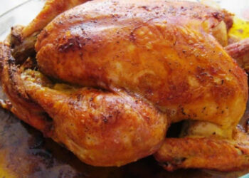 Capão recheado assado no forno