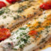 Pescada no forno com tomate